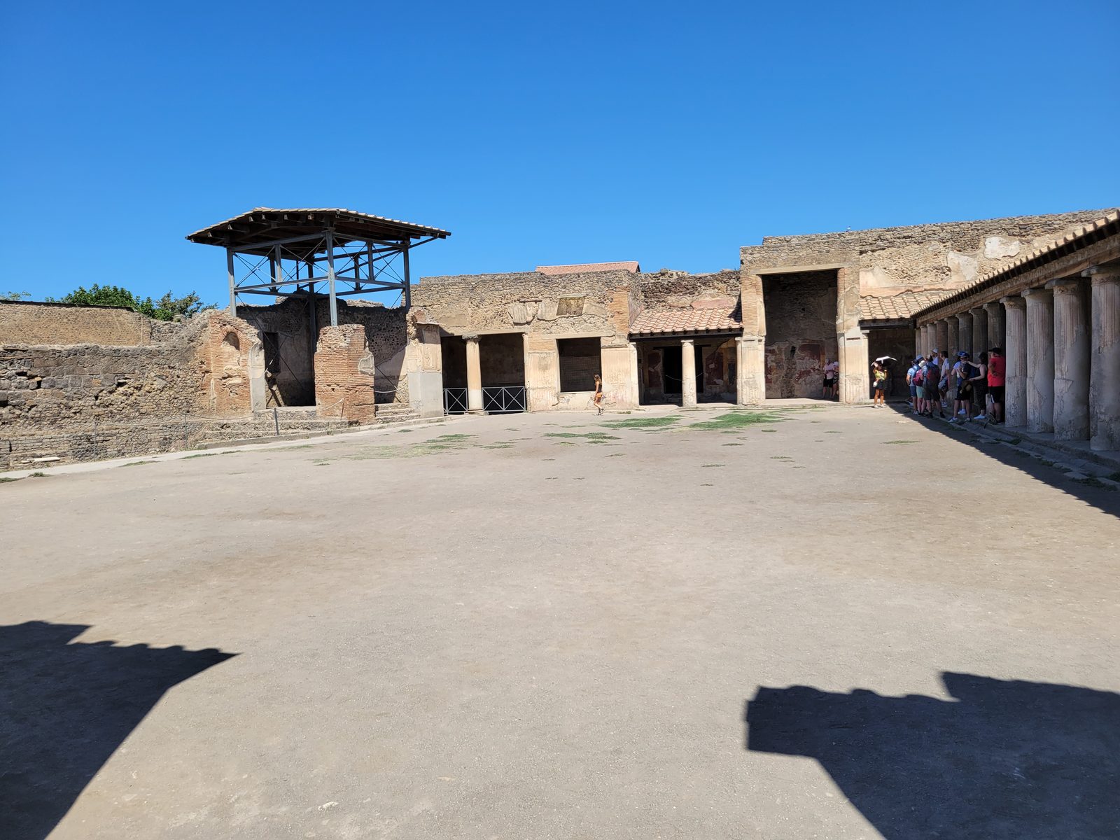 A long stone colonnade in Pompeii