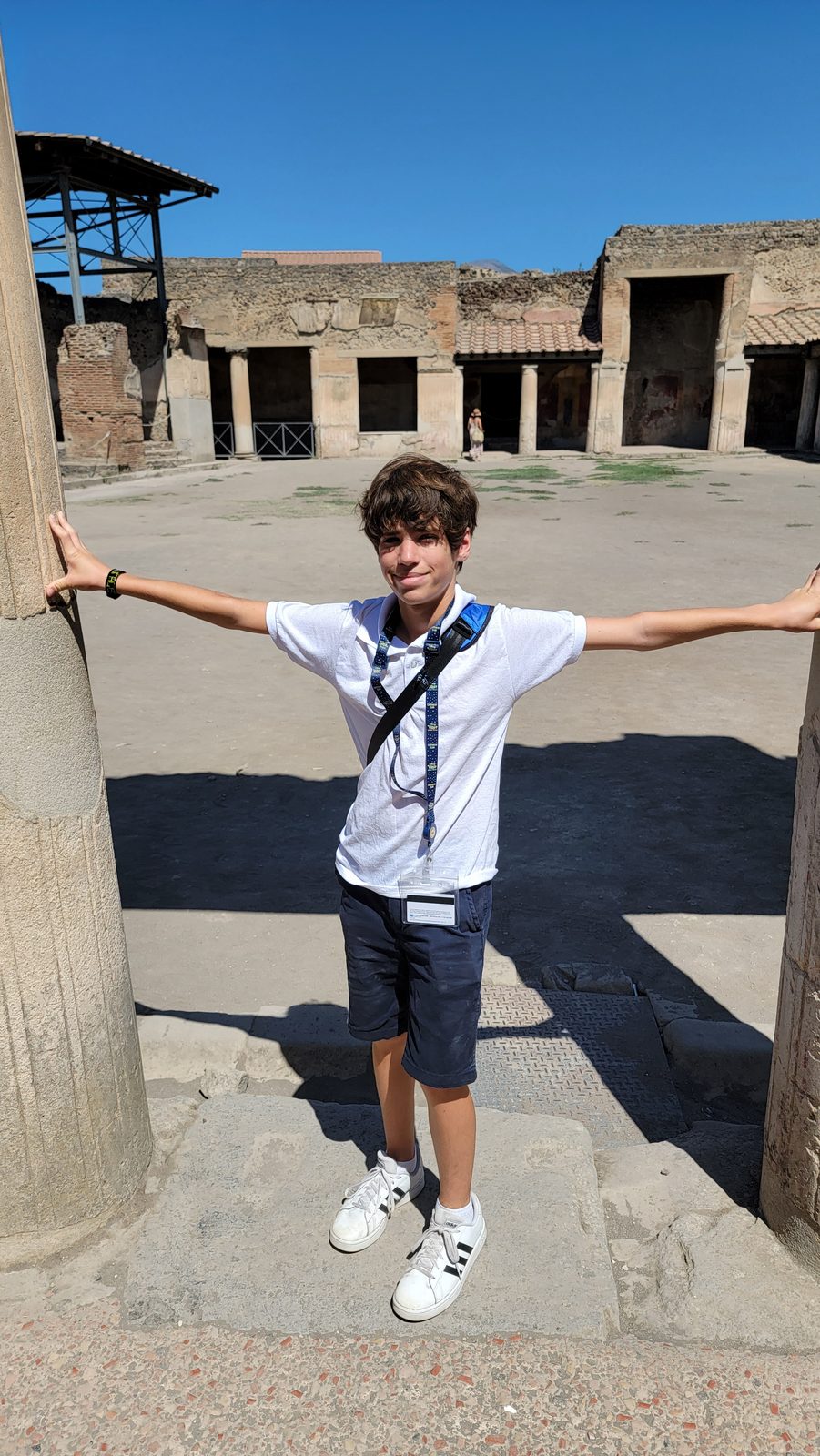 Thomas stretched between two columns