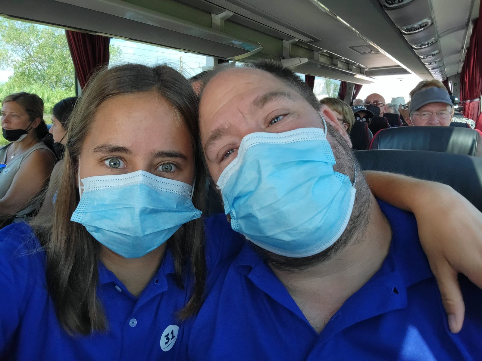 Lisa and me masked on the coach to Pisa