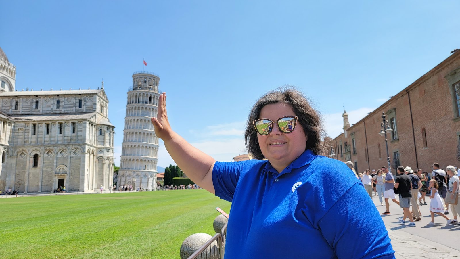 Kathy holding up the Leaning Tower