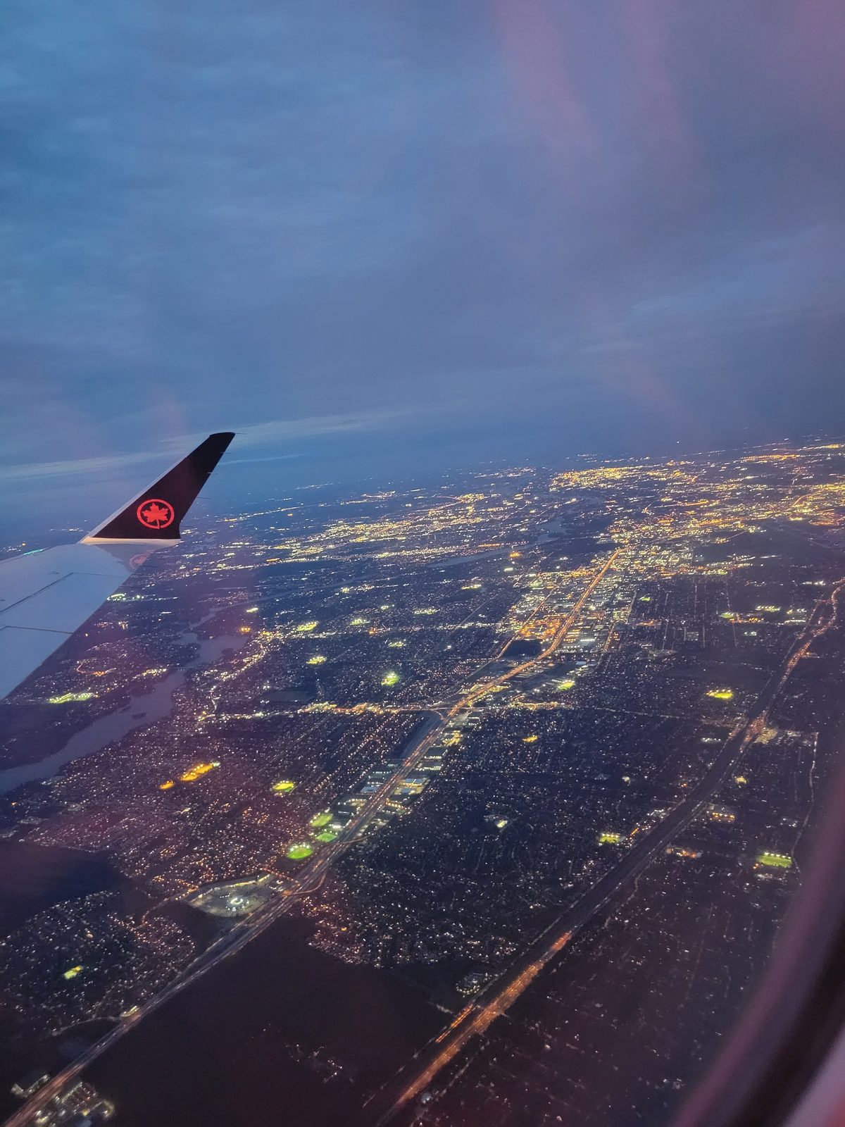 City lights under the wing on the way into O'Hare