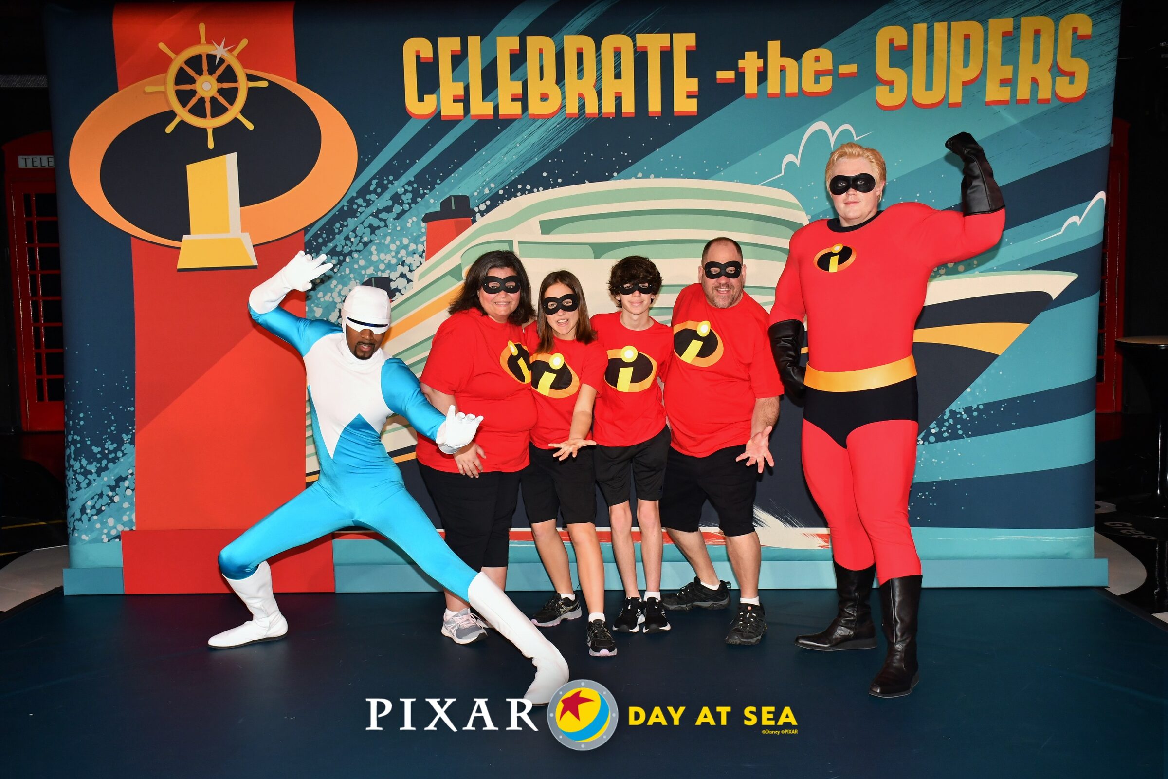 With Frozone and Mr Incredible on Pixar Day