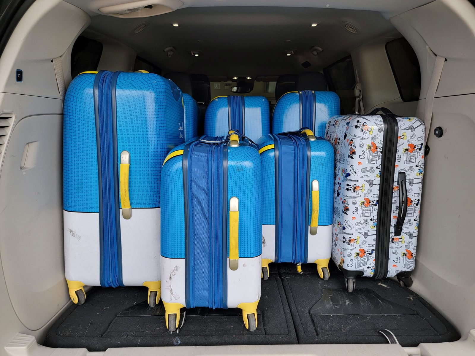 Our Disney suitcases packed for the airport