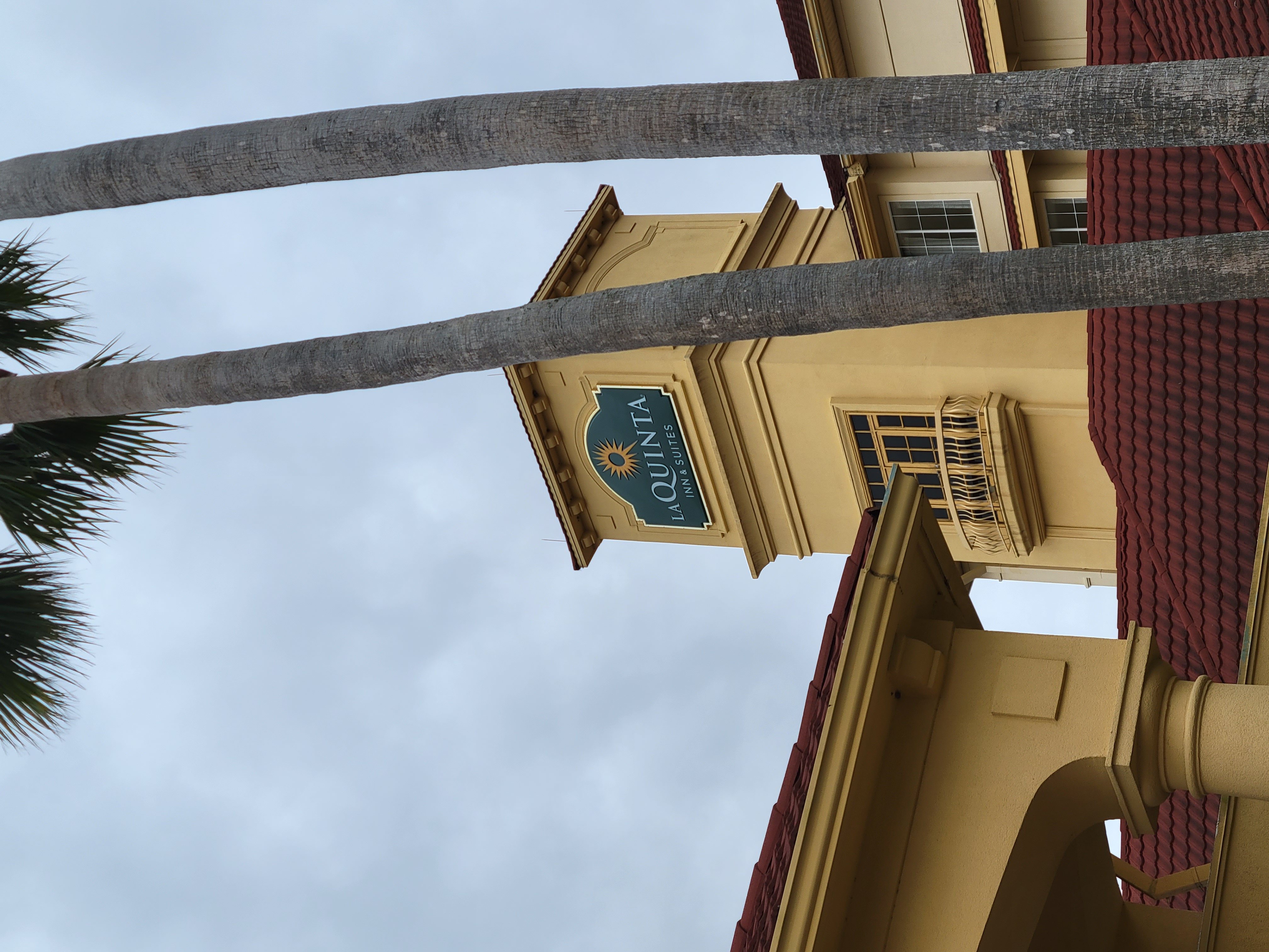 We stayed at the La Quinta before the port
