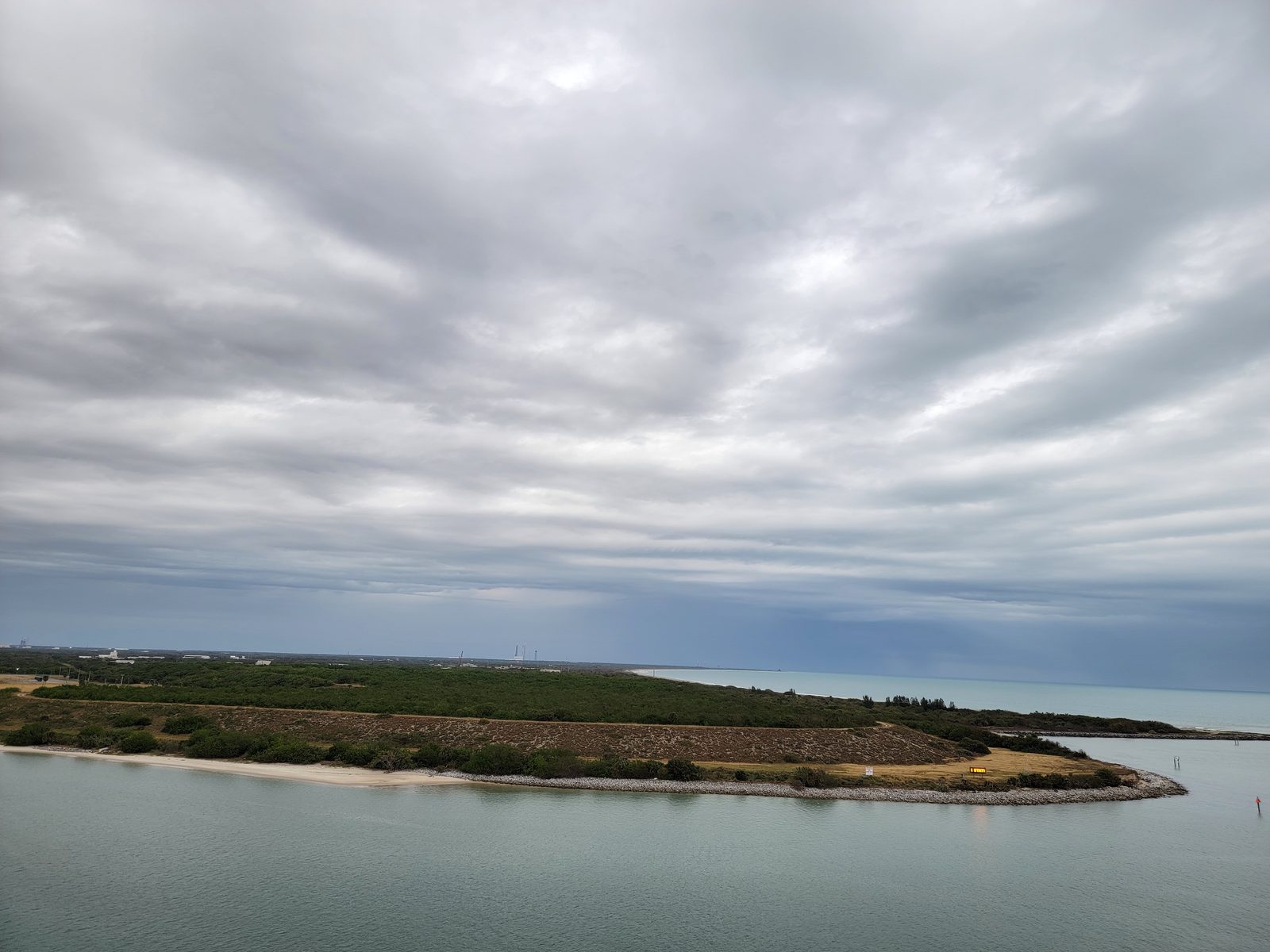 Sailing away from Port Canaveral under cloudy skies