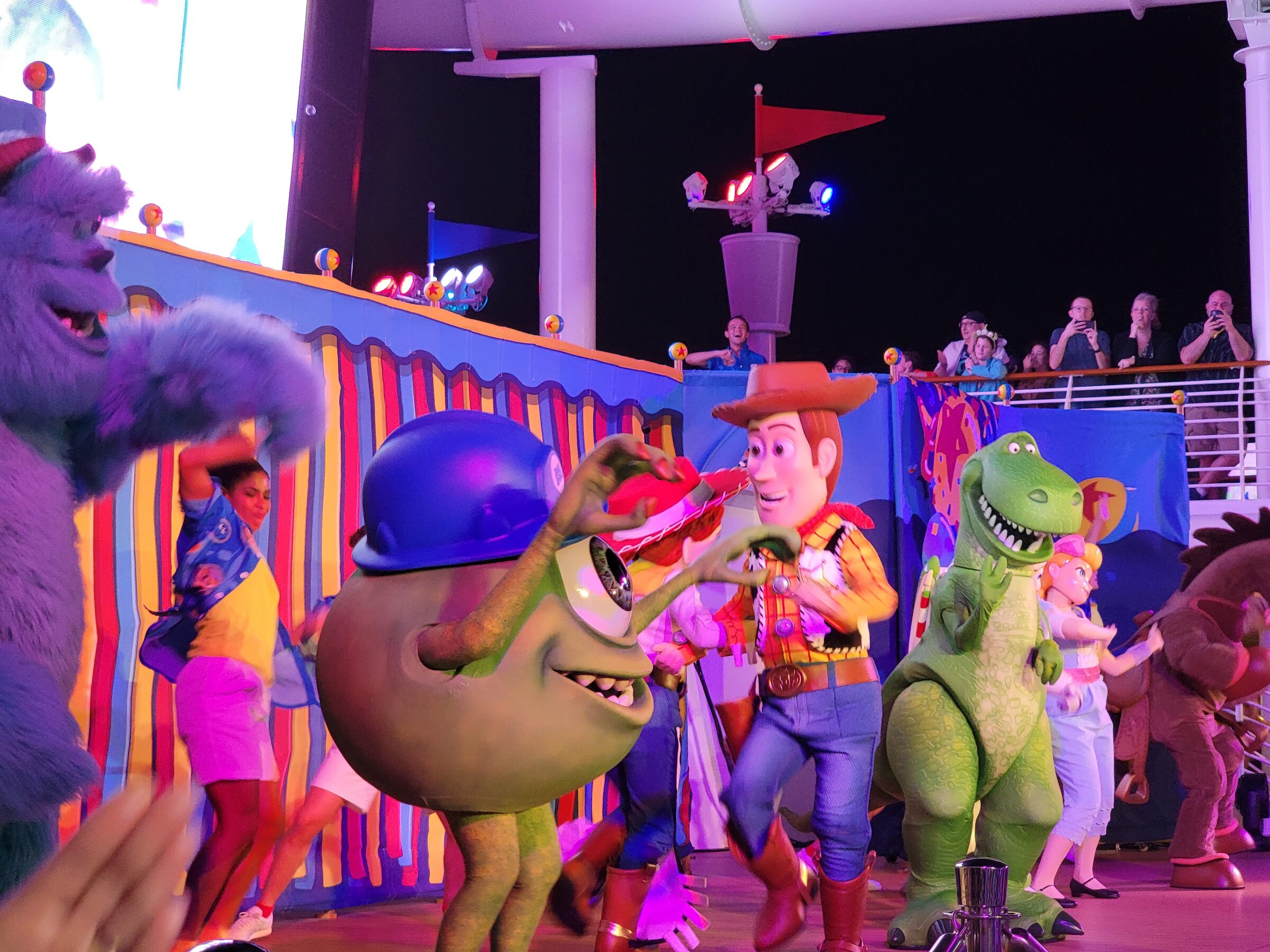 Mike Wazowski, Woody, Rex & Sully dancing at the Pixar Day at Sea Party