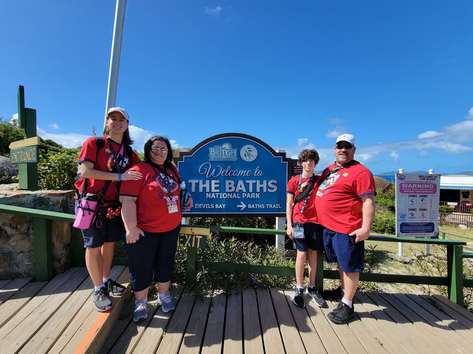 The four of us at The Baths entrance sign