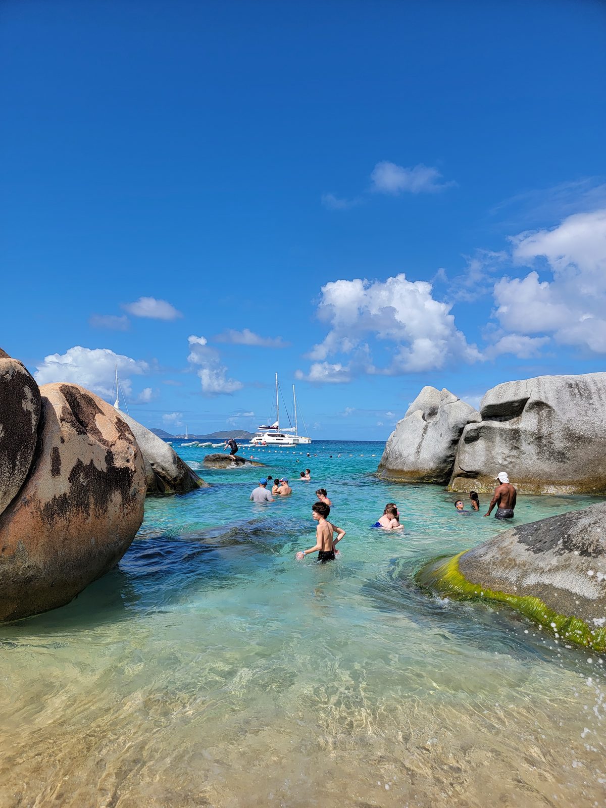 The clear pools among the boulders at The Baths