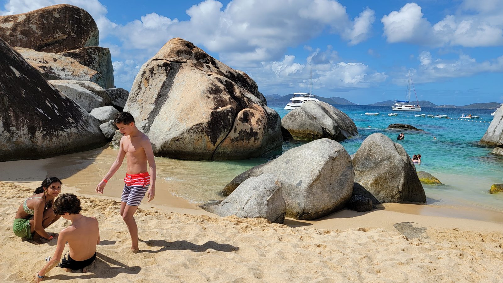 Thomas making his way over the rocks at The Baths