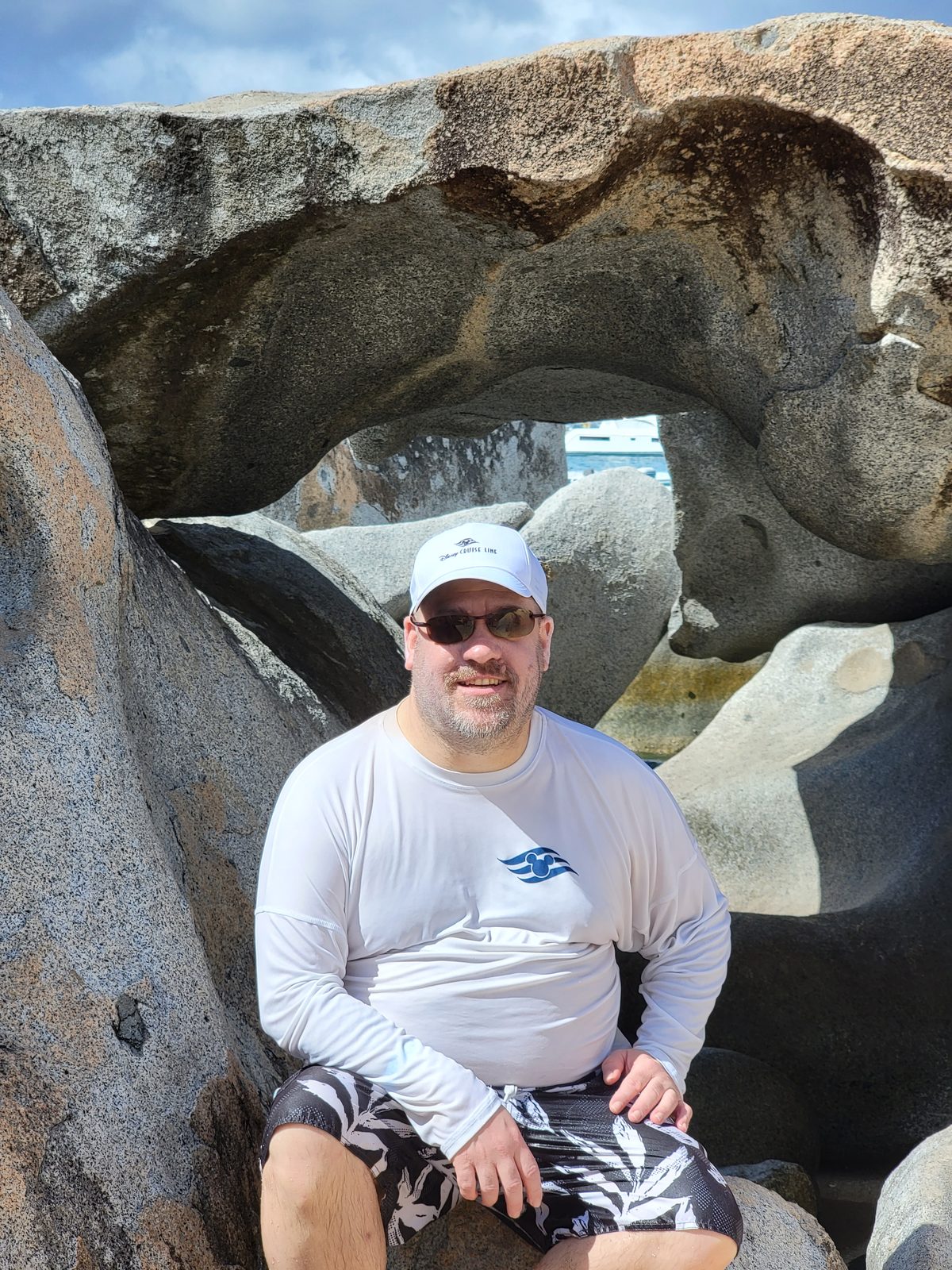 Michael under the boulders at The Baths