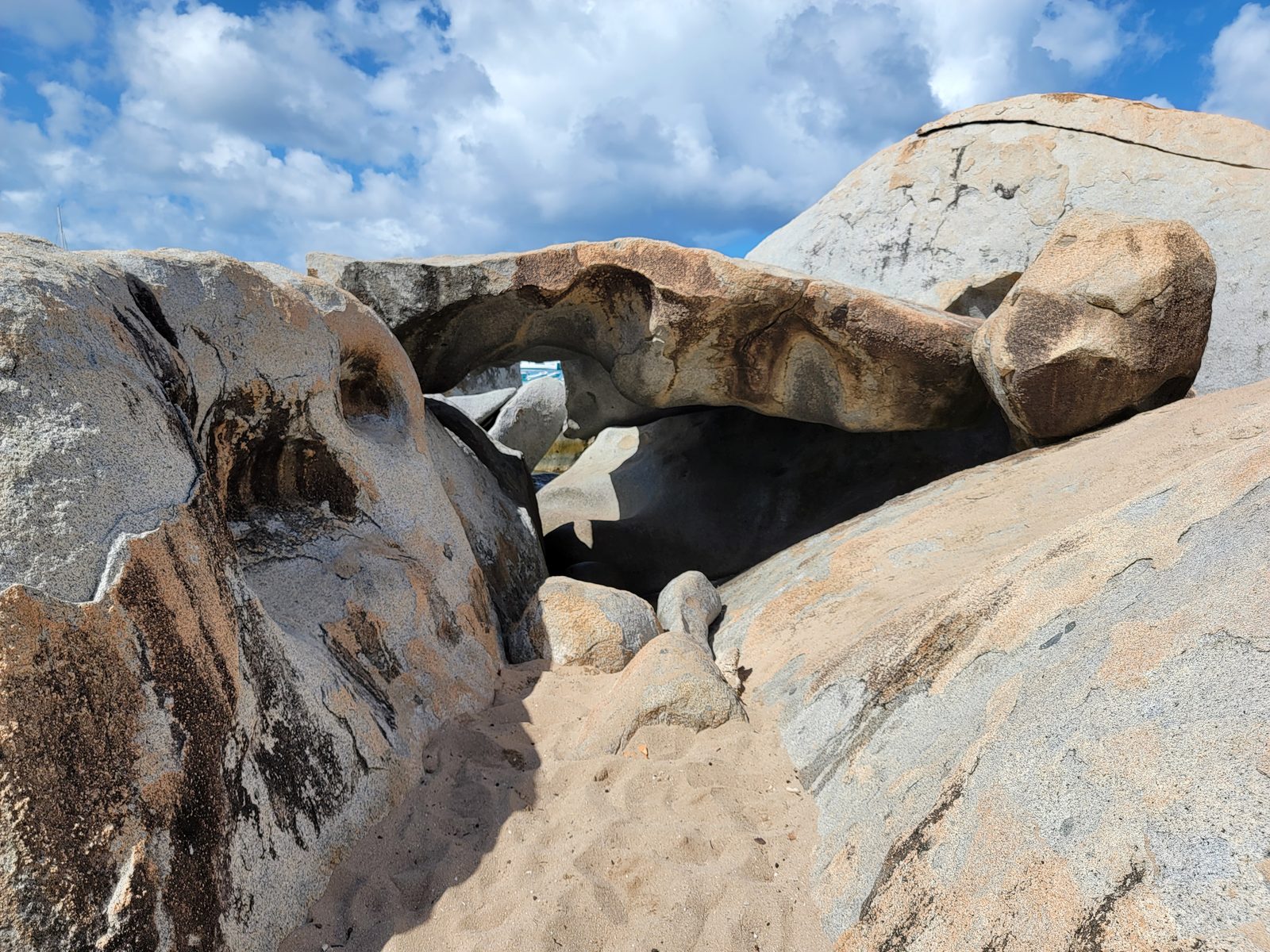 A boulder arch on the beach at The Baths