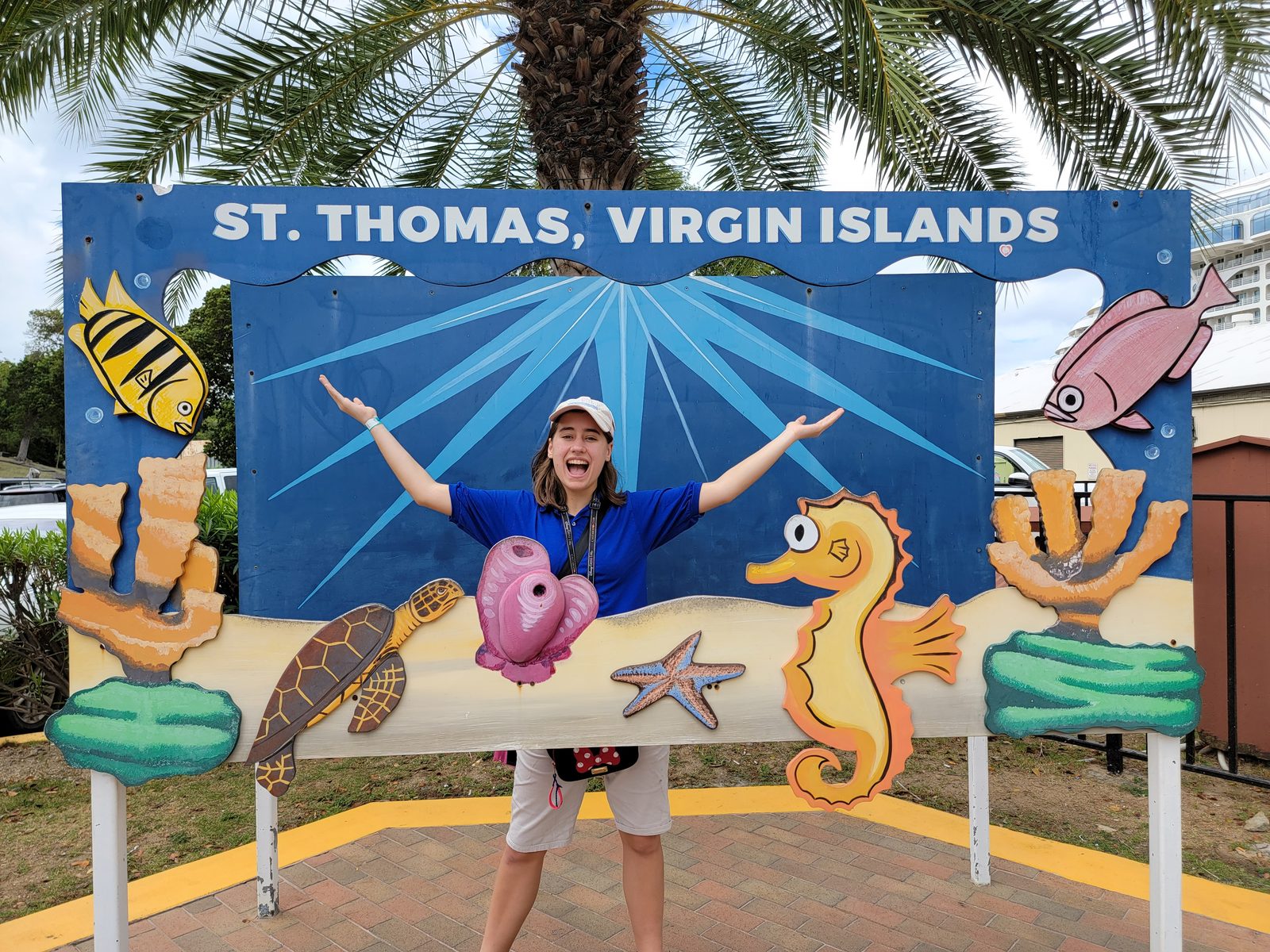 Lisa at the St. Thomas backdrop near the ship