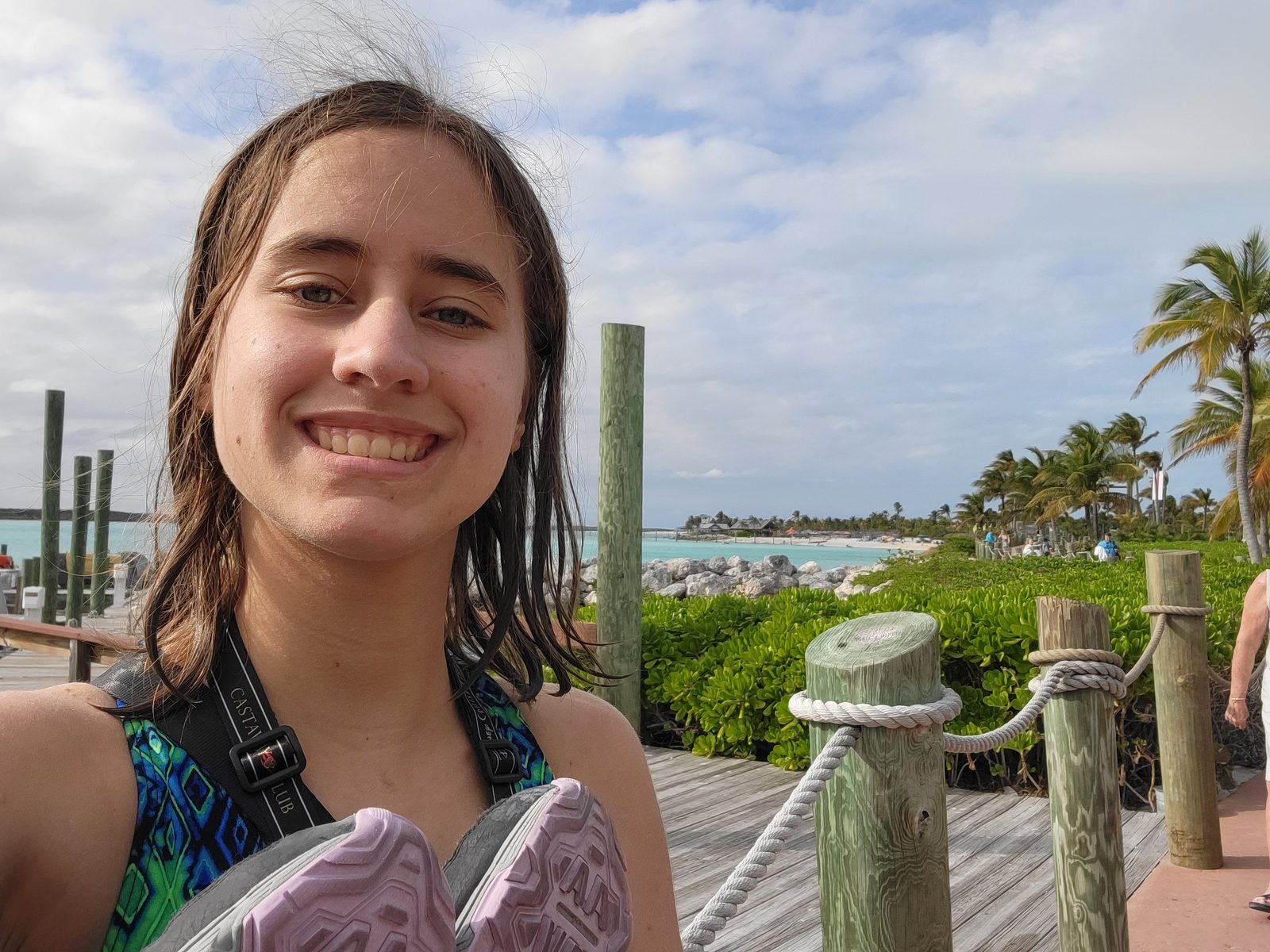 Lisa on the boardwalk above the beach