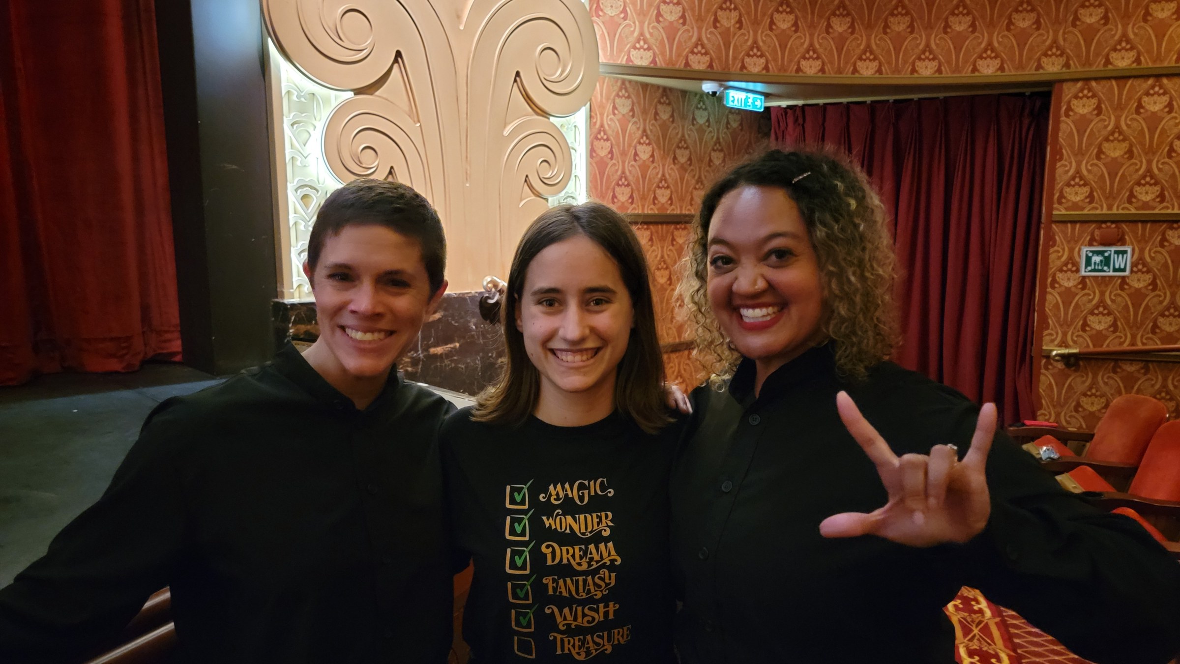 Lisa with Joy and Angelique, our ASL interpreters, in the theatre