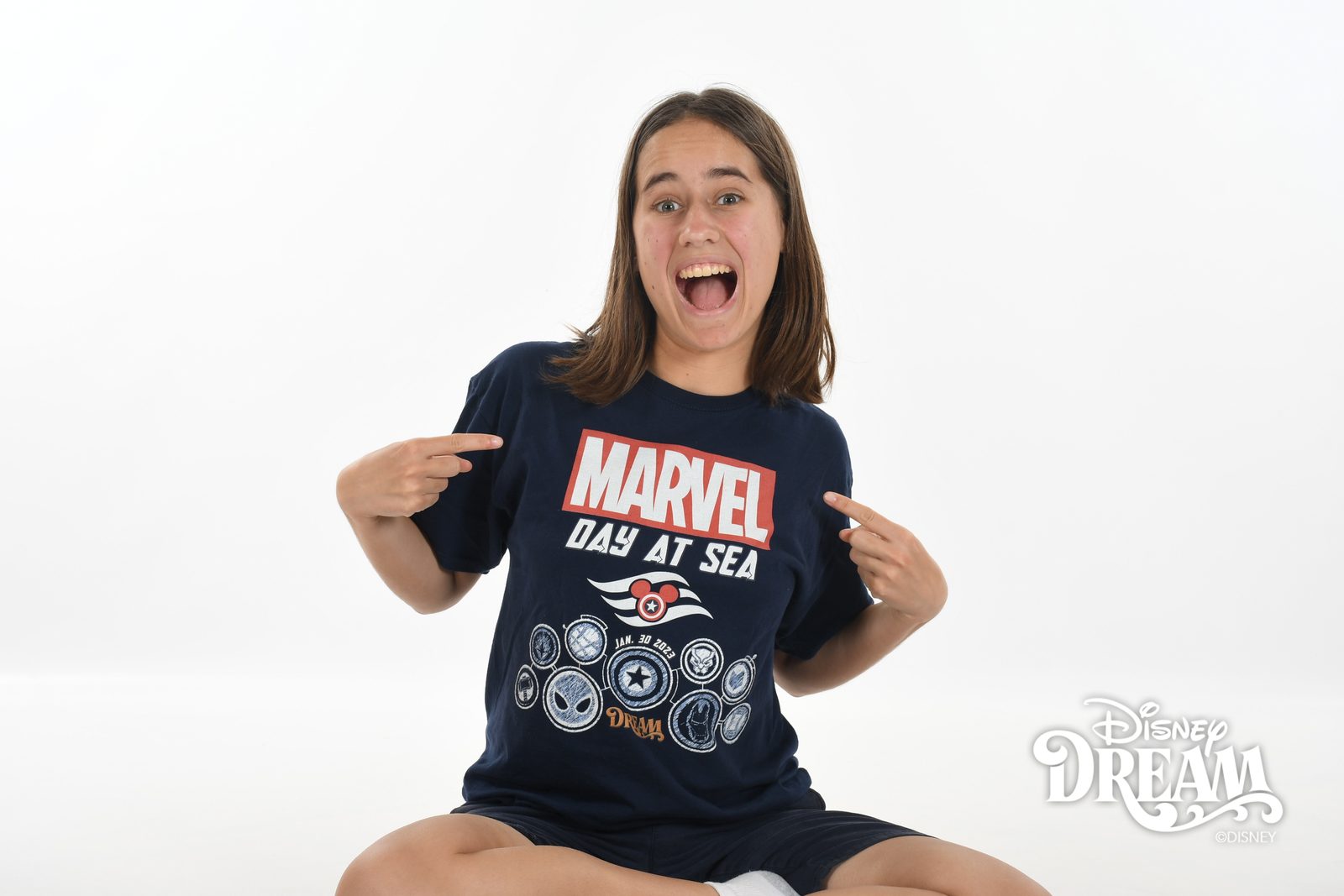 Lisa showing off our Marvel Day at Sea shirt on the Disney Dream