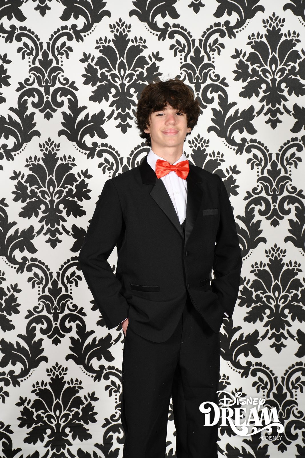 Thomas in his tuxedo and red bow tie