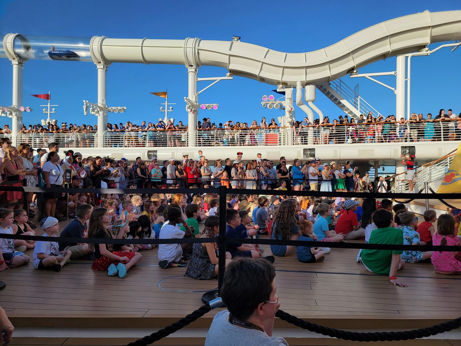 Guests crowding the decks for sail-away