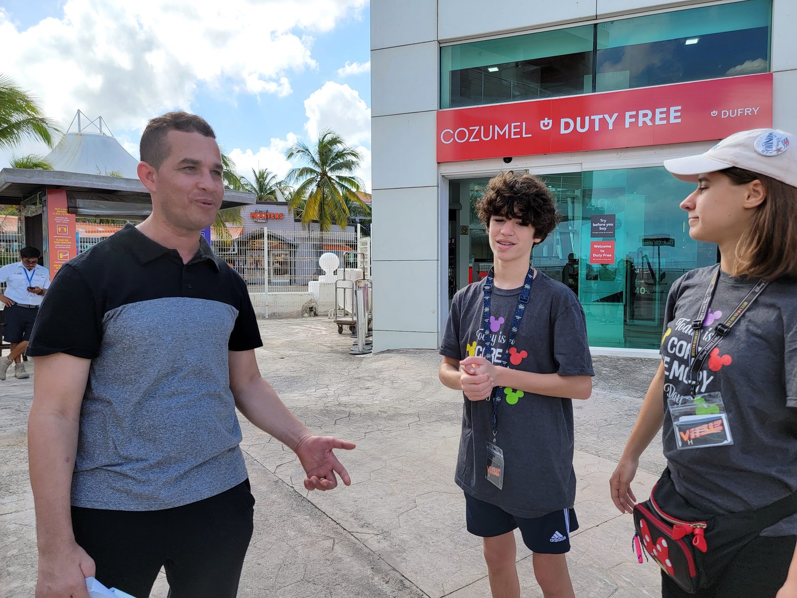 Talking it over outside Cozumel Duty Free