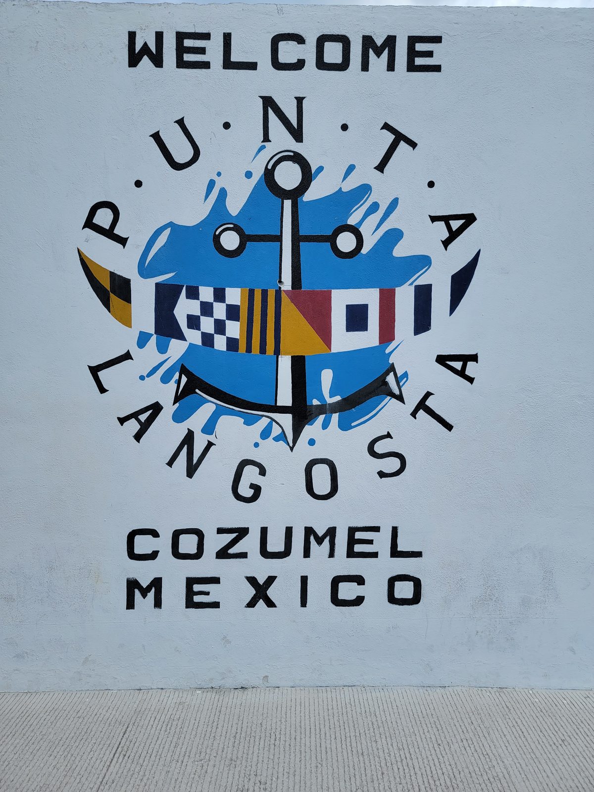 The welcome sign at Punta Langosta