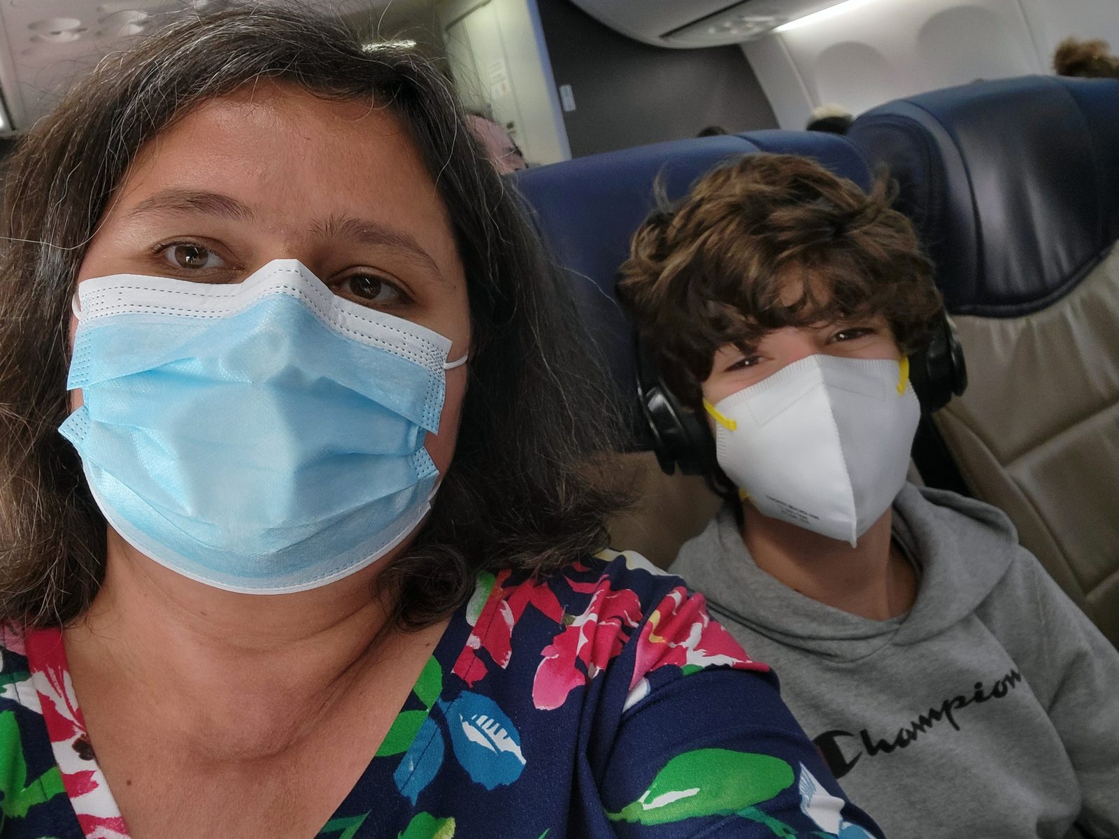 Kathy and Thomas masked up for the flight home