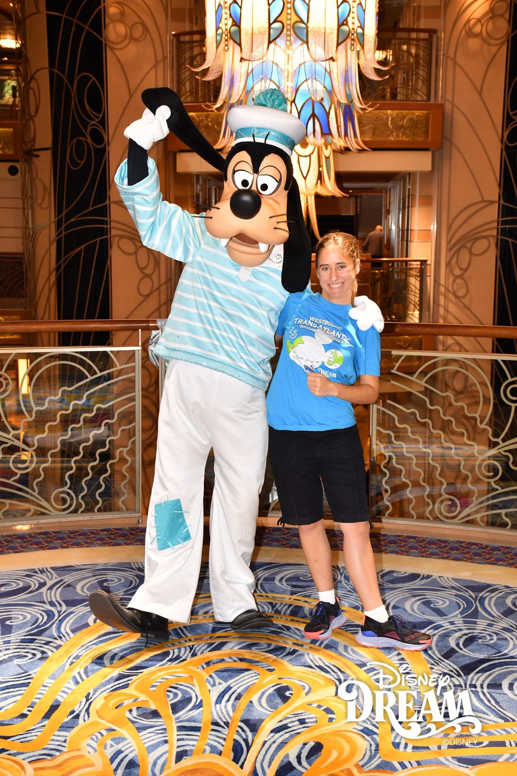 Goofy in his Silver Anniversary outfit and Lisa in the Lobby Atrium