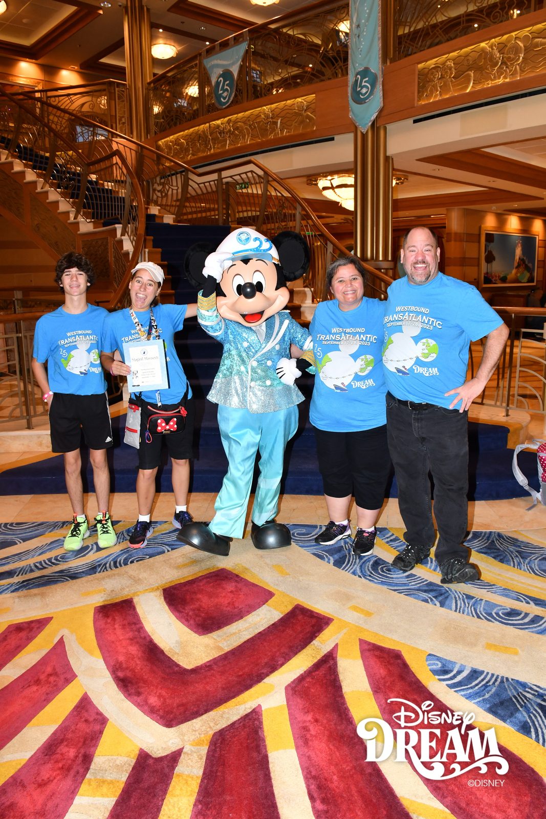 Family of the Day in the Lobby Atrium: Thomas, Lisa, Mickey in his Silver Anniversary outfit, Kathy and Michael