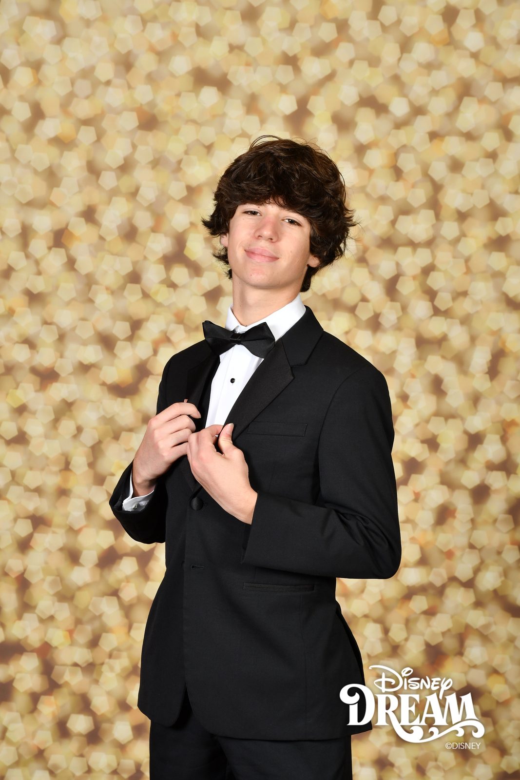 Thomas in his formal portrait on the Disney Dream