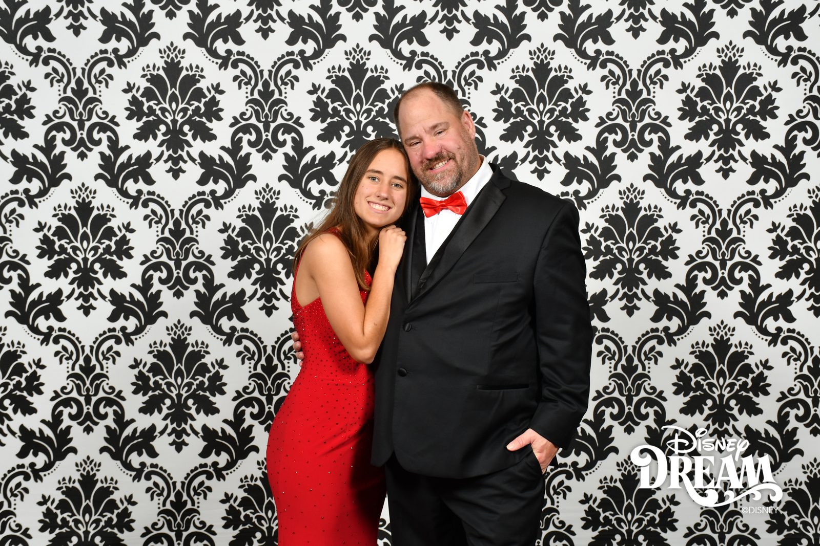 Lisa and Michael in a formal portrait on the Disney Dream