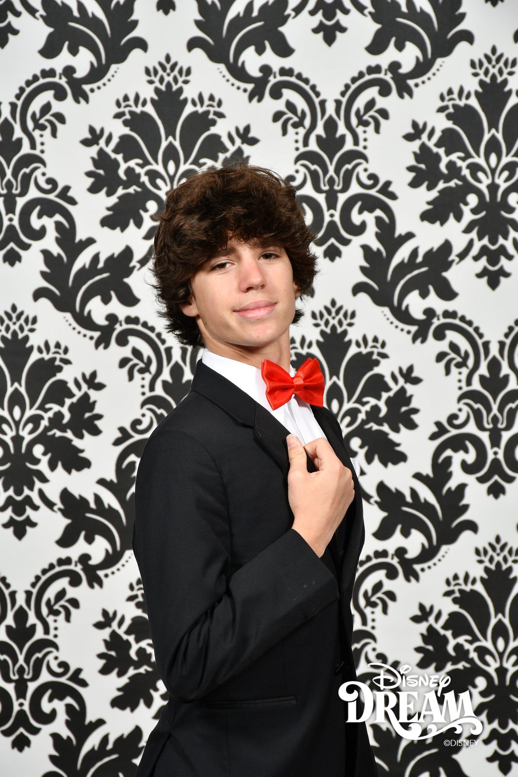 Thomas in his formal portrait on the Disney Dream