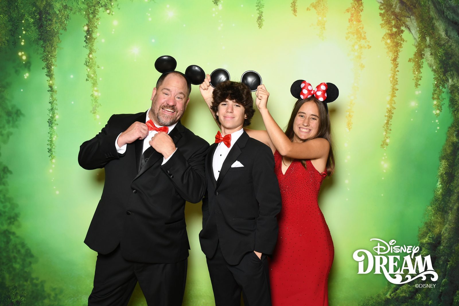 Michael, Thomas and Lisa in formal portraits on the Disney Dream