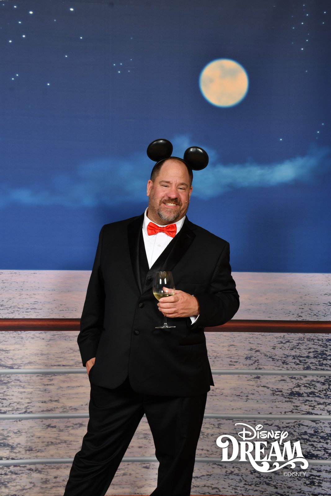 Michael at the moon backdrop on the Disney Dream