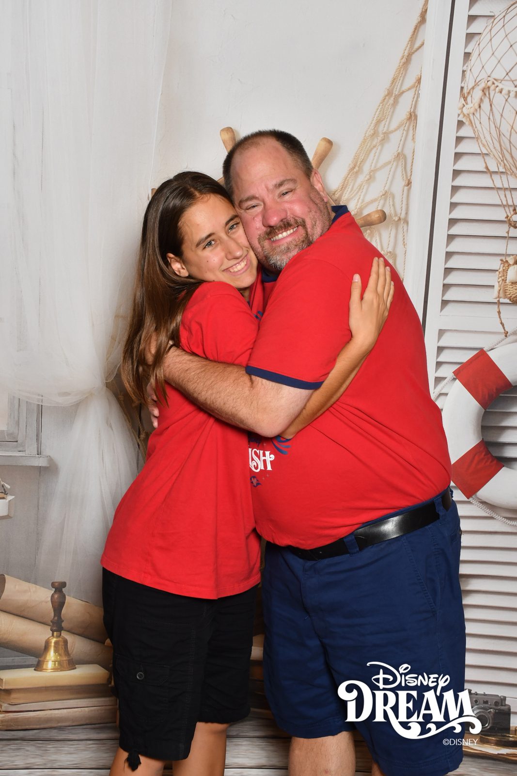 Lisa and Michael sharing a hug on the Disney Dream