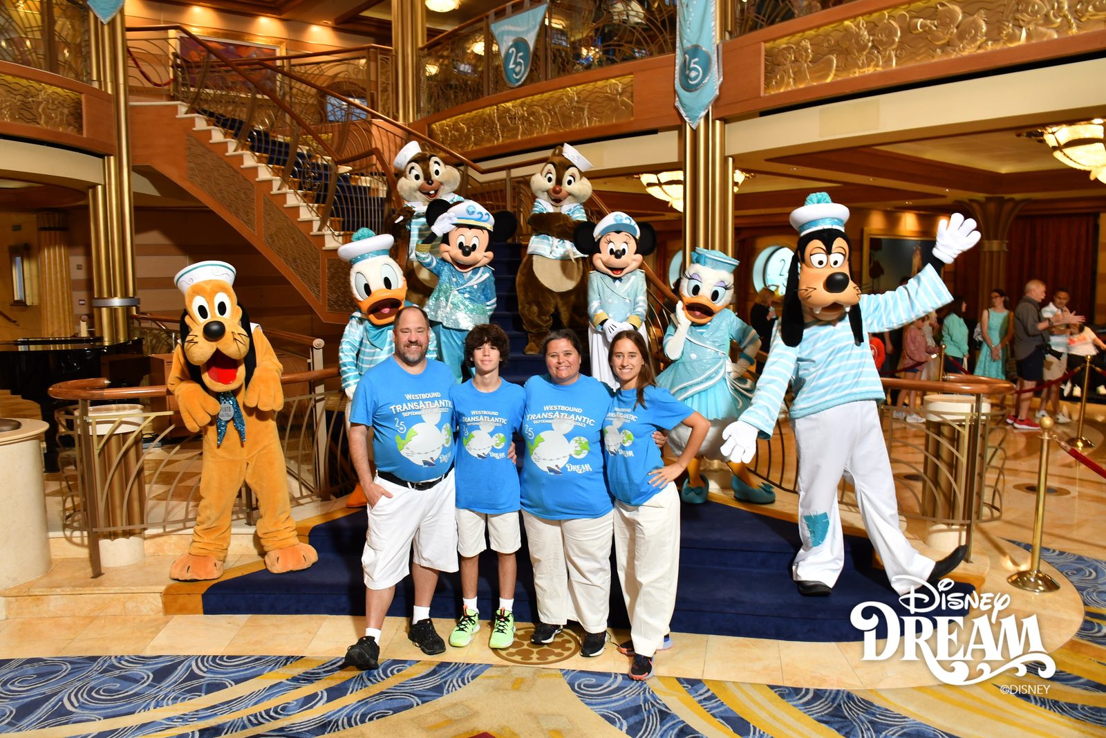 Pluto, Donald, Mickey, Chip, Dale, Minnie, Daisy and Goofy in their Silver Anniversary outfits with Michael, Thomas, Kathy and Lisa in the Lobby Atrium