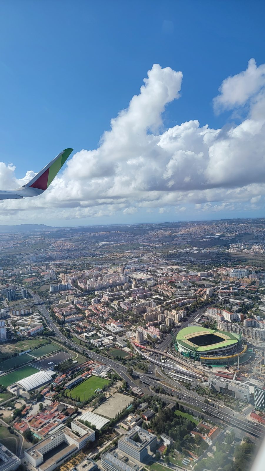 Lisbon falling away below us after takeoff