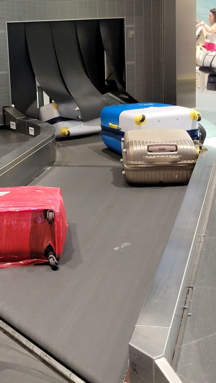Waiting for bags at the Heathrow carousel