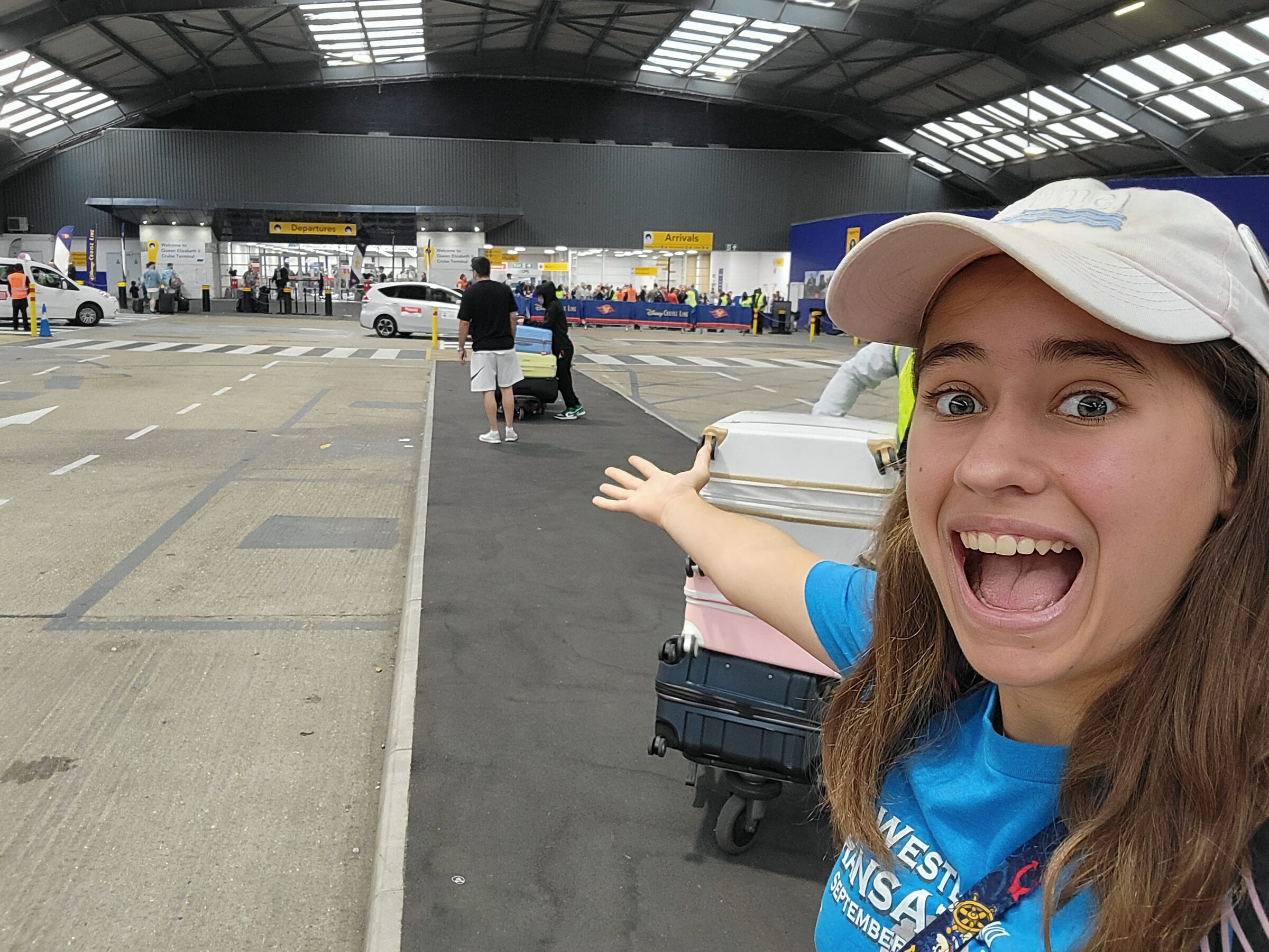 Lisa pointing out our bags at the terminal