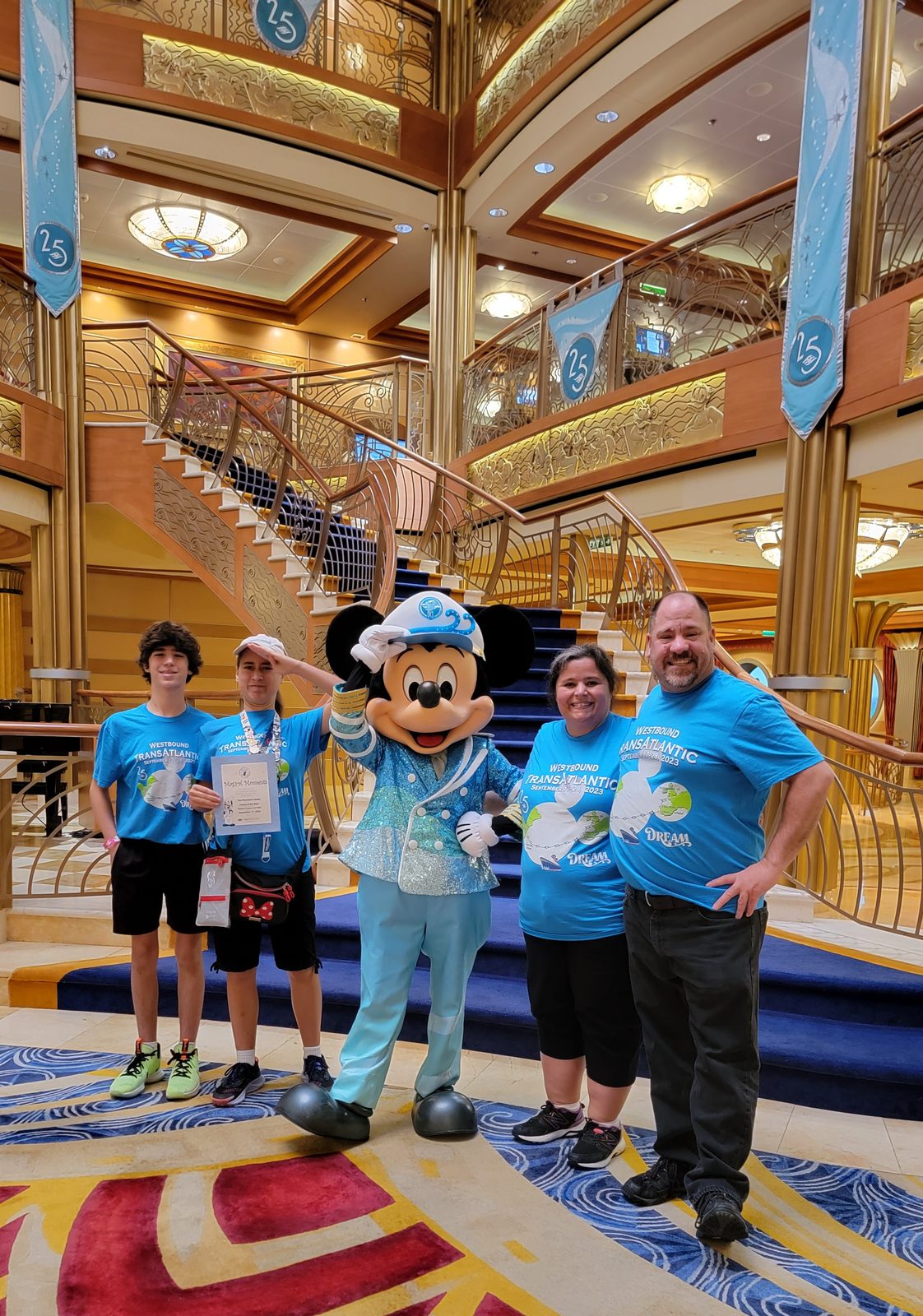 Family of the Day in the Lobby Atrium: Thomas, Lisa, Mickey in his Silver Anniversary outfit, Kathy and Michael