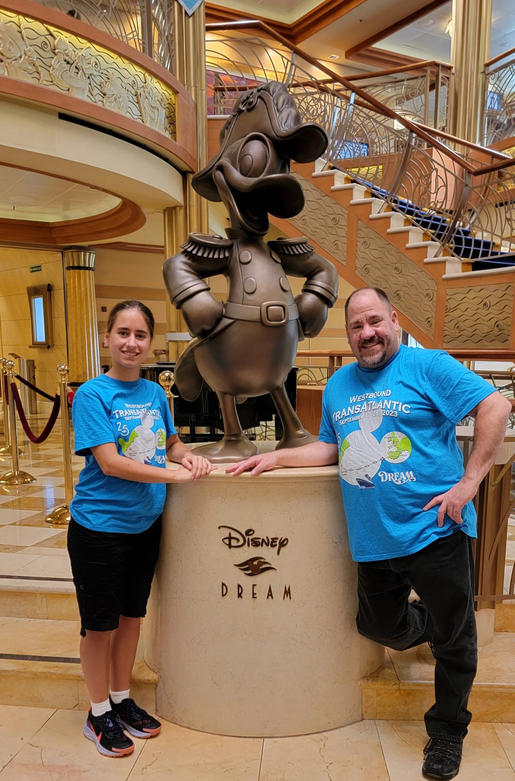 Lisa and Michael with the Donald statue on the Disney Dream