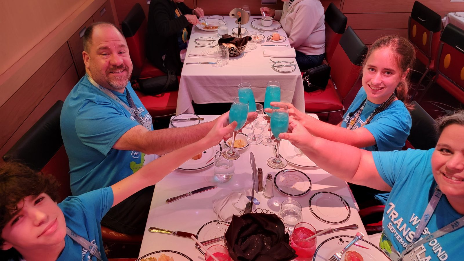 A toast with Kathy, Lisa and Thomas at dinner