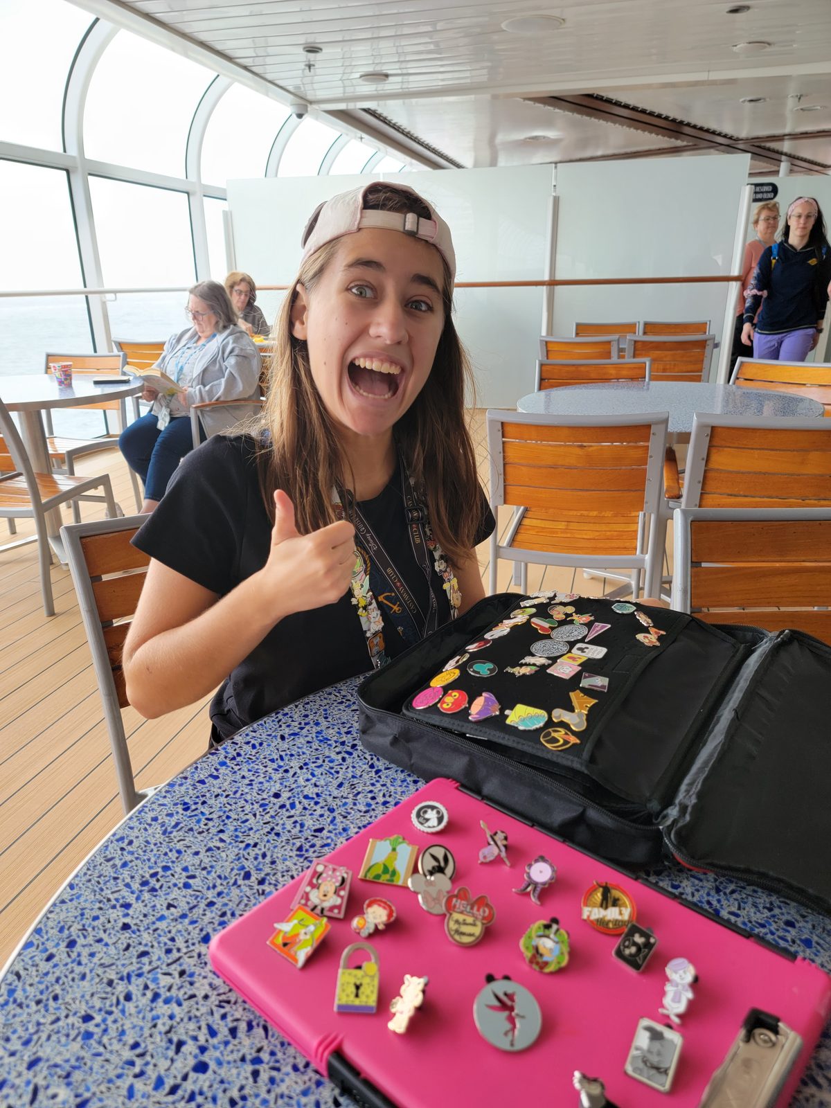 Lisa trading pins on deck