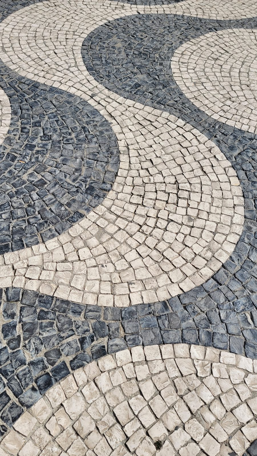 Wavy cobblestone pavement at Rossio in Lisbon