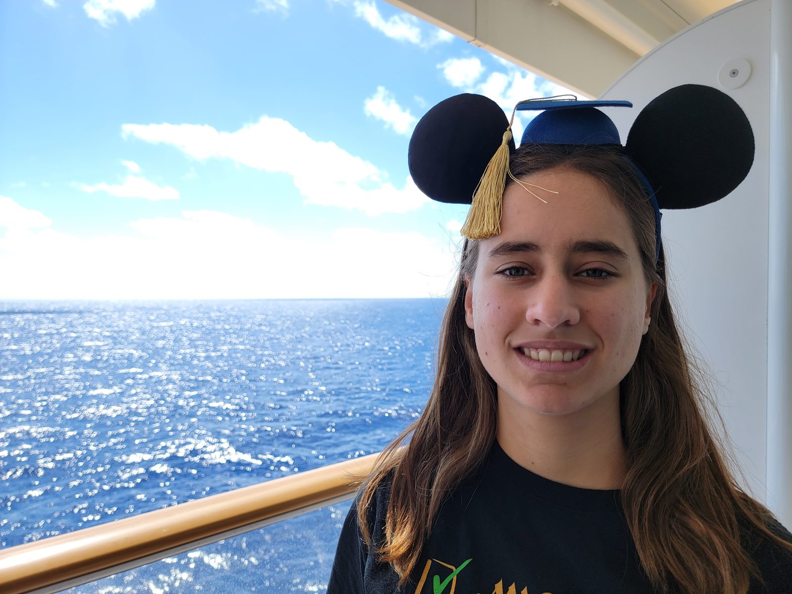 Lisa in her graduate-style Mickey ears