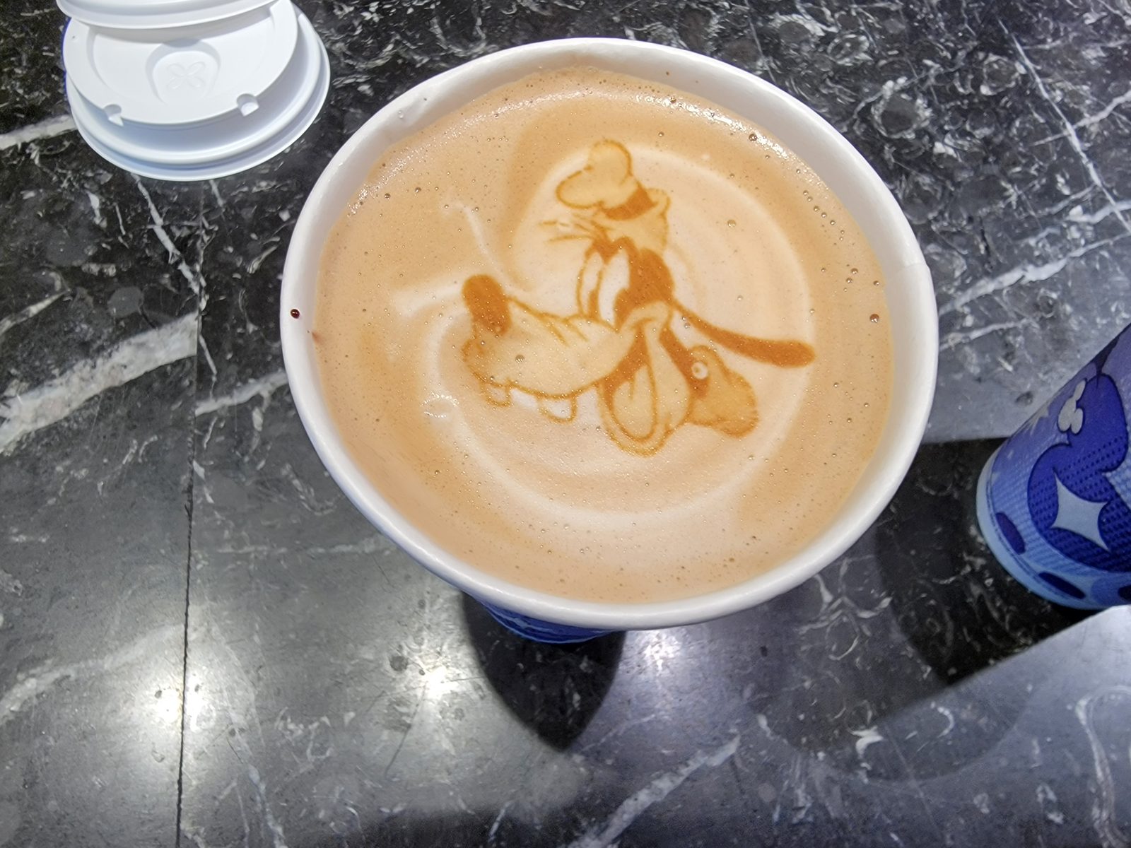 Goofy drawn in the coffee foam