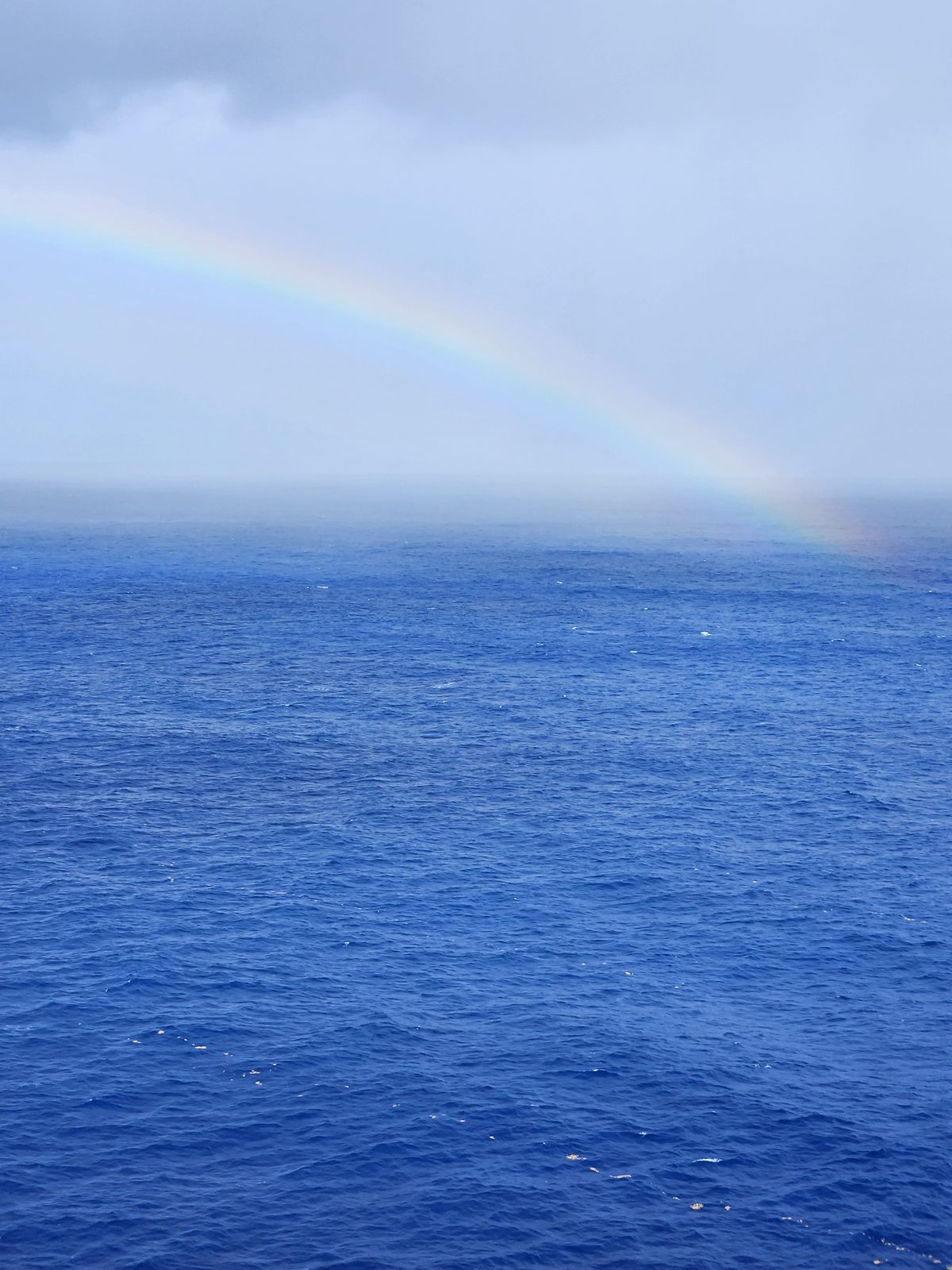 A rainbow over the open water