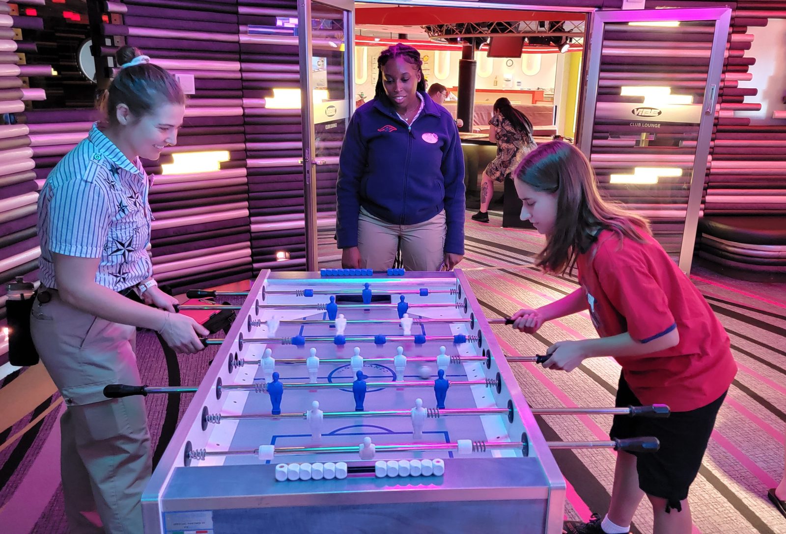 A round of foosball in the ship's arcade
