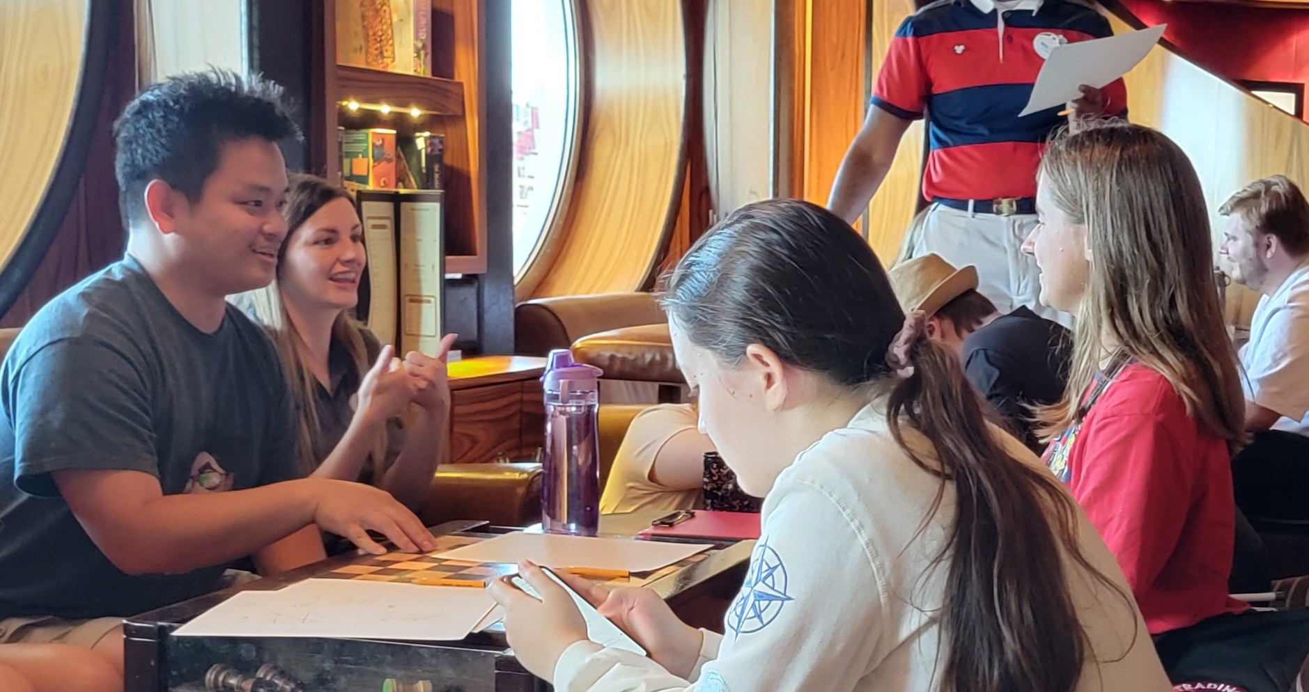 Erika, one of our ASL interpreters, interpreting during an activity in the lounge