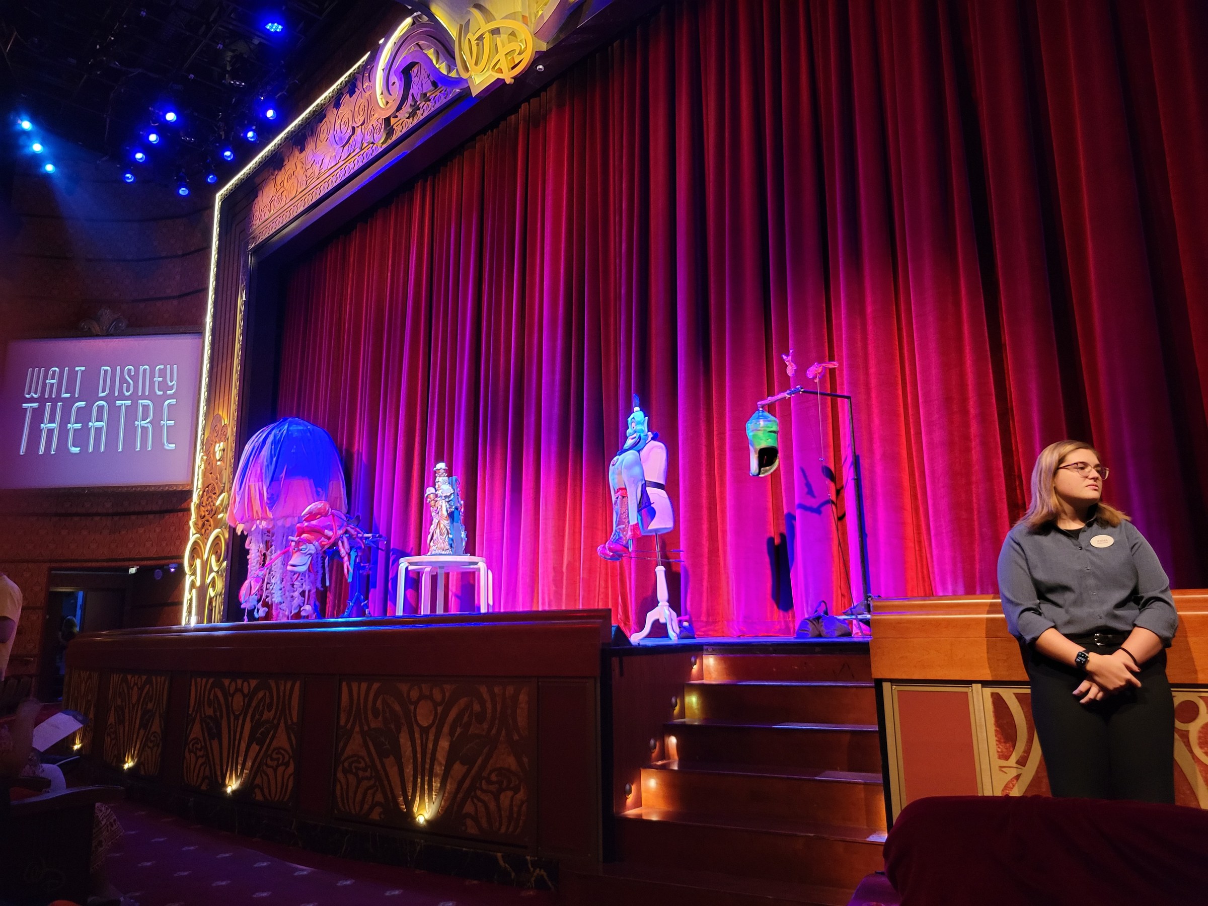 Jenna beside the stage in the Walt Disney Theatre