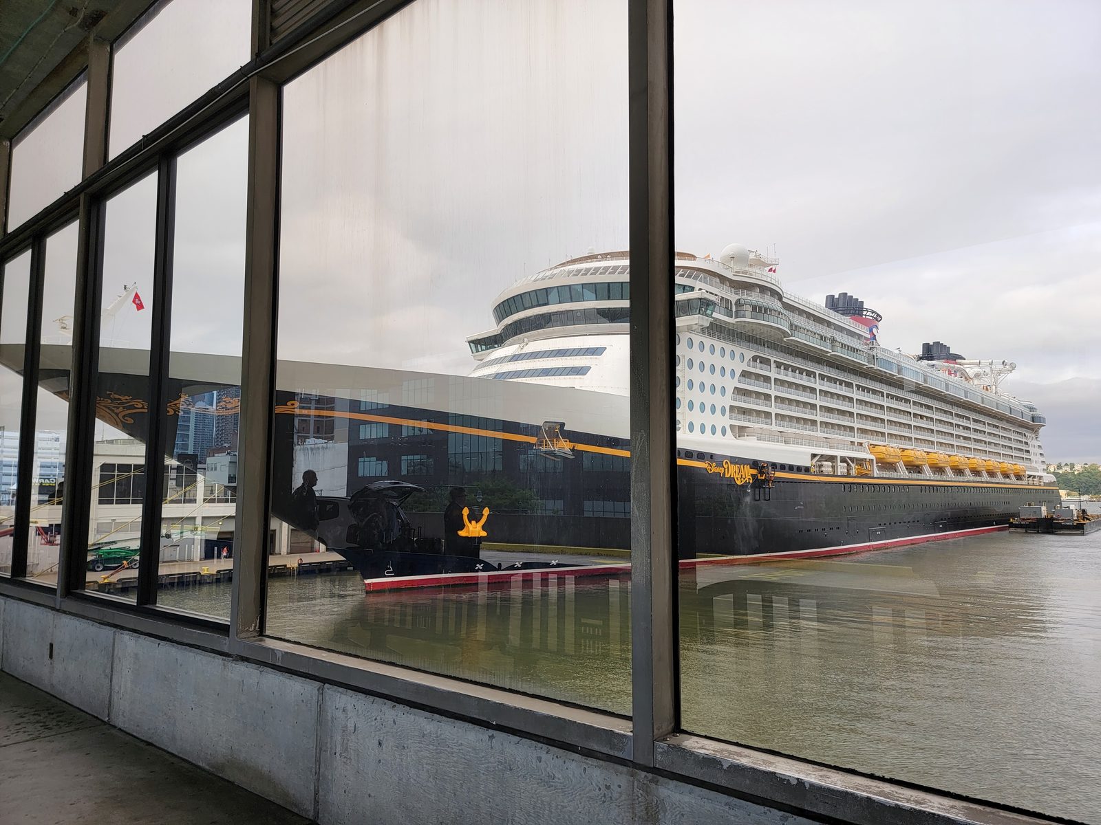 The Dream at the pier, through the terminal glass