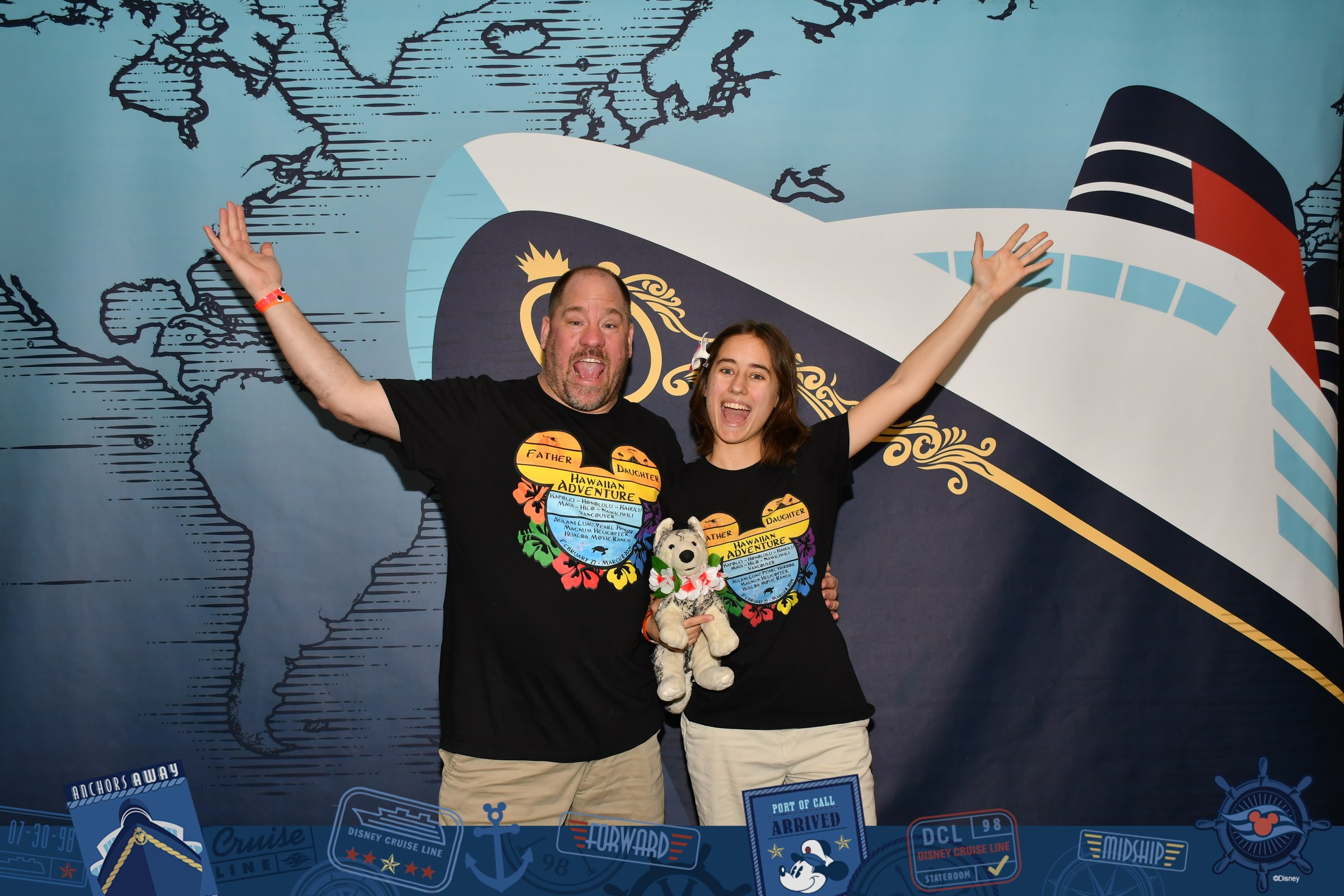 Lisa, Bob and Michael at the boarding backdrop in our Hawaiian Adventure shirts