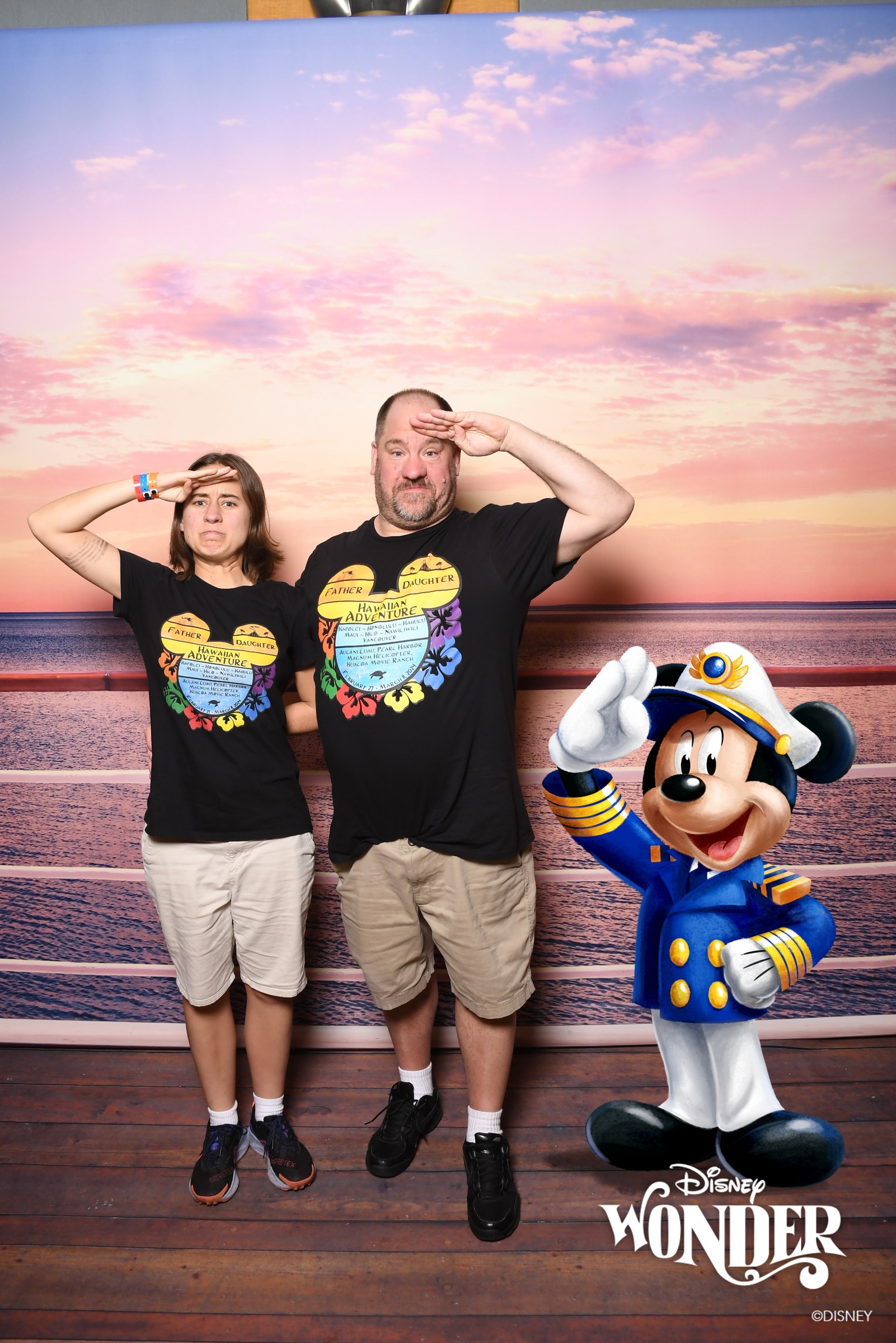 Lisa and Michael saluting a Magic Shot Captain Mickey